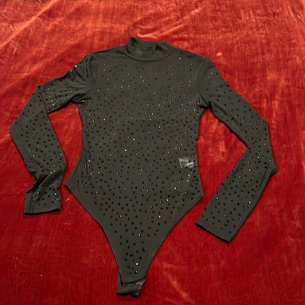 Celebrity Black sequined bodysuit.